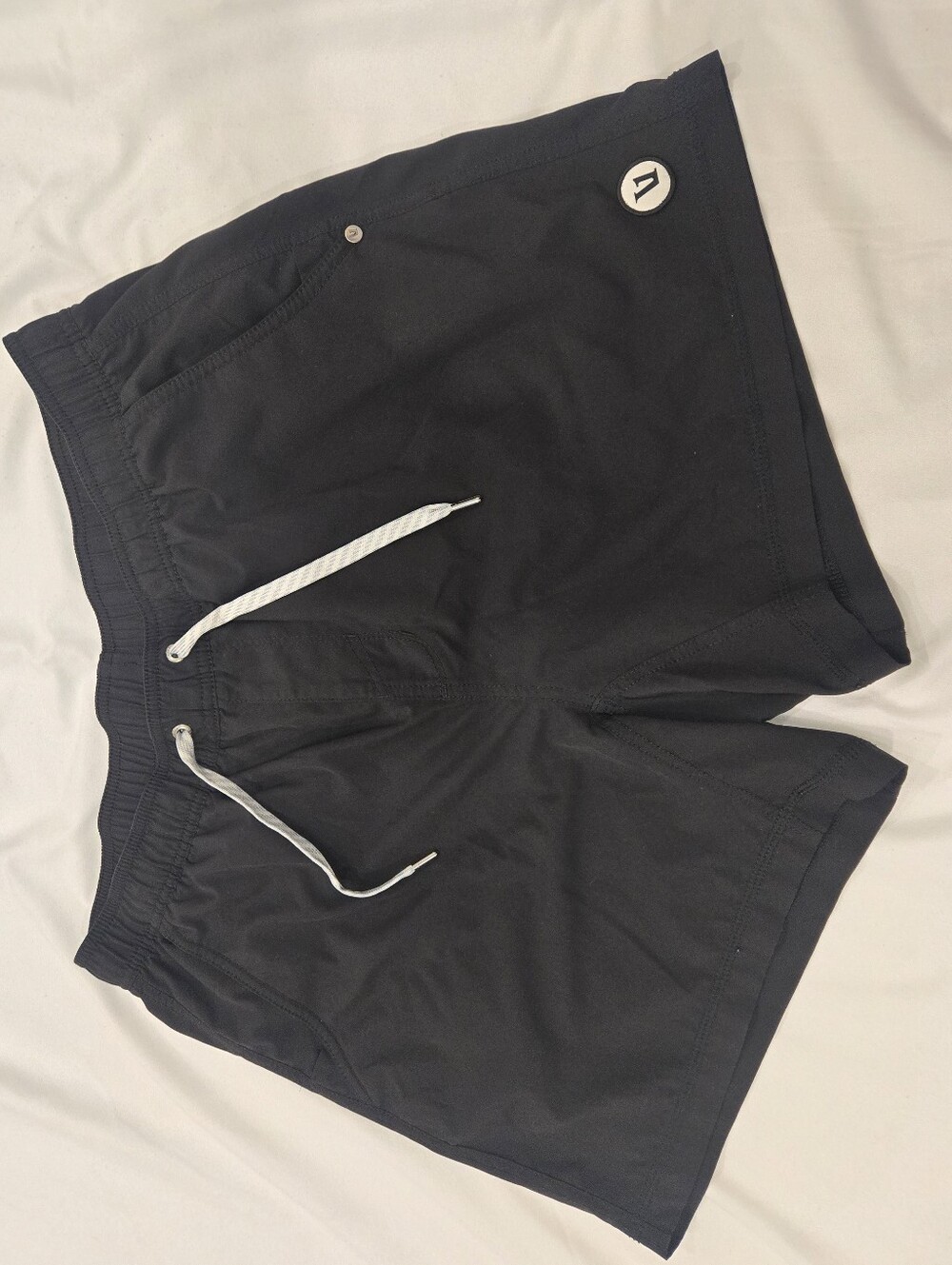 Vuori Men's Black Athletic Drawstring Shorts with White Accents